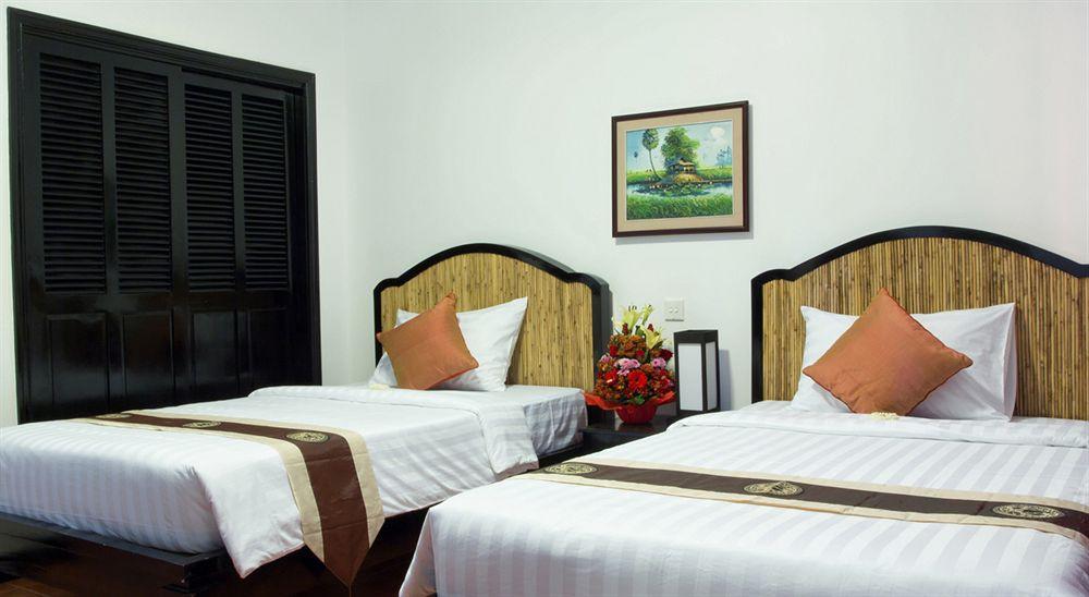 סיאם ריפ 洱湾精品酒店wind Boutique Hotel חדר תמונה