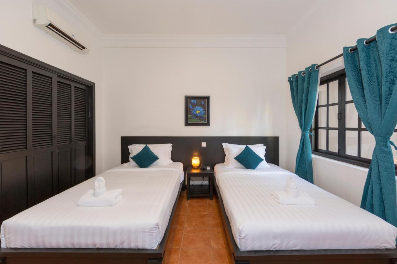 סיאם ריפ 洱湾精品酒店wind Boutique Hotel מראה חיצוני תמונה